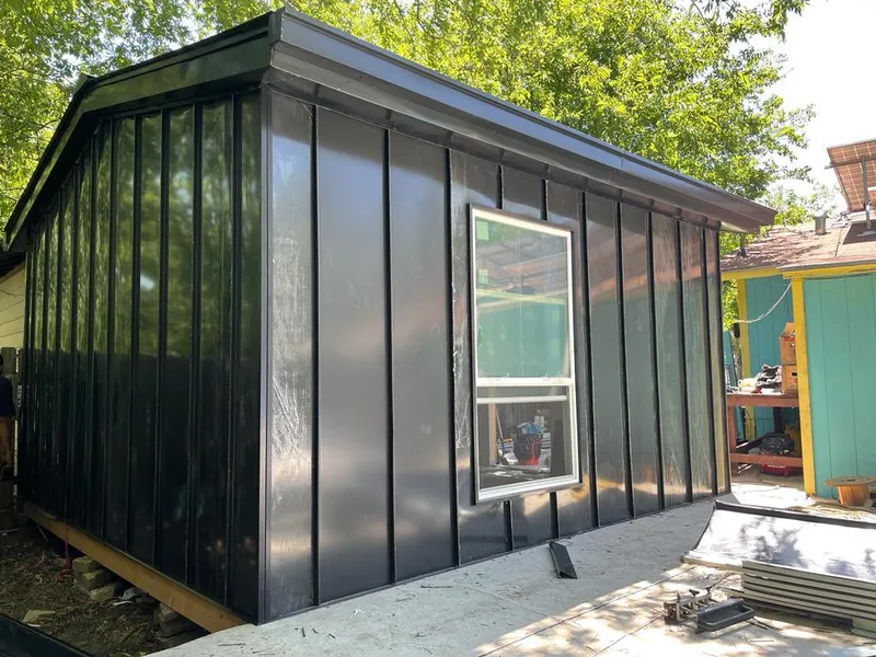 Black standing seam metal wall panels for Metal Roof Installation in Enid