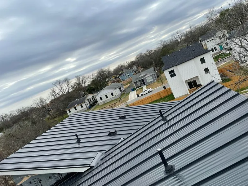 Standing seam metal roof panels with vents for Skylight Repair in Enid